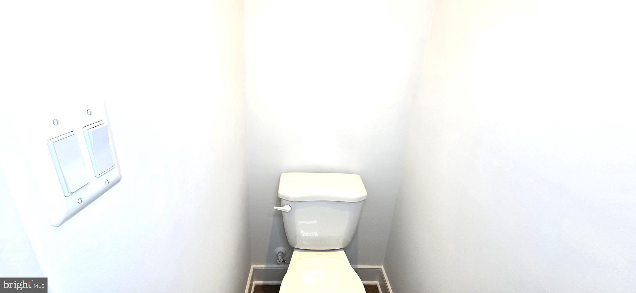 1726 Blacksmith Way Frederick, MD 21702 - Photo 46 of 64 a bathroom with a toilet and a sink