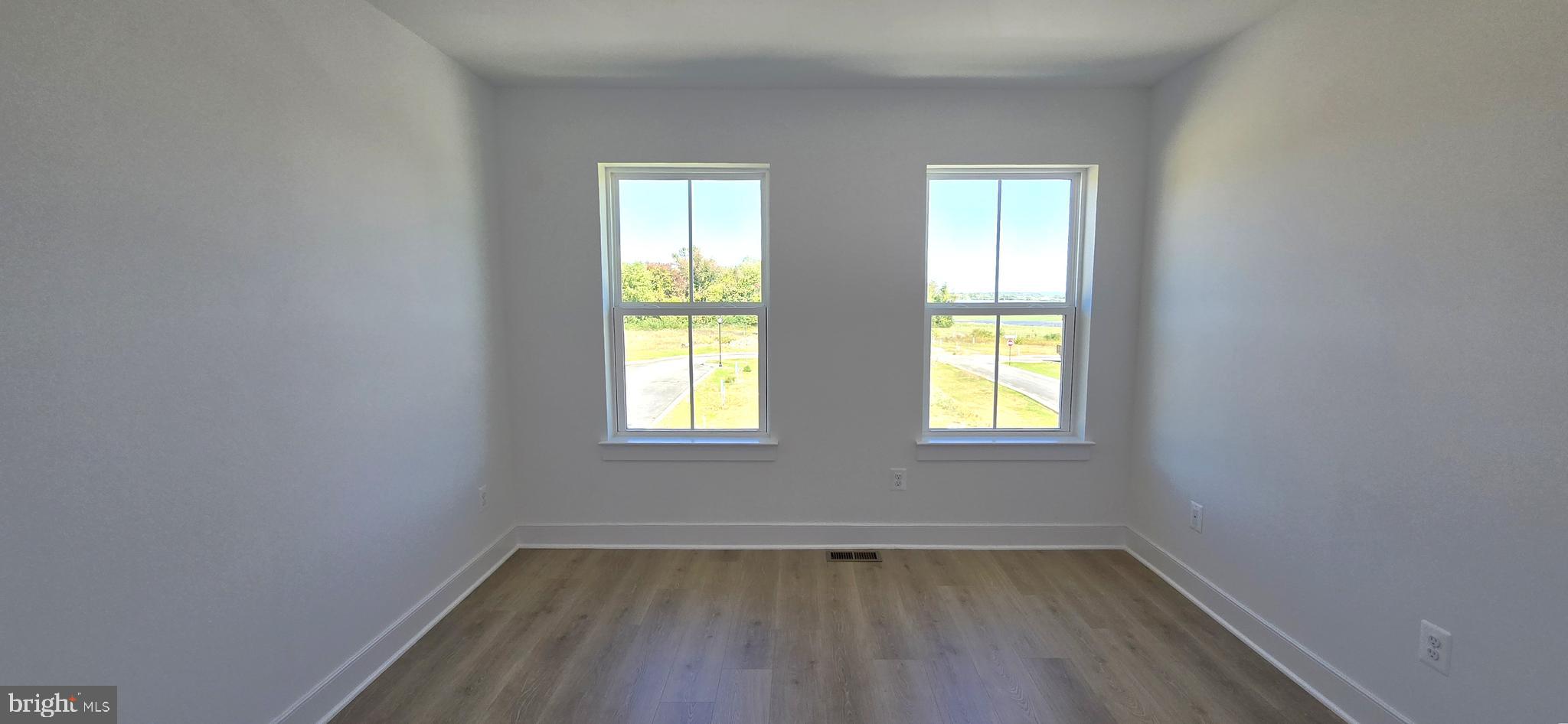 1726 Blacksmith Way Frederick, MD 21702 - Photo 57 of 64 an empty room with a window