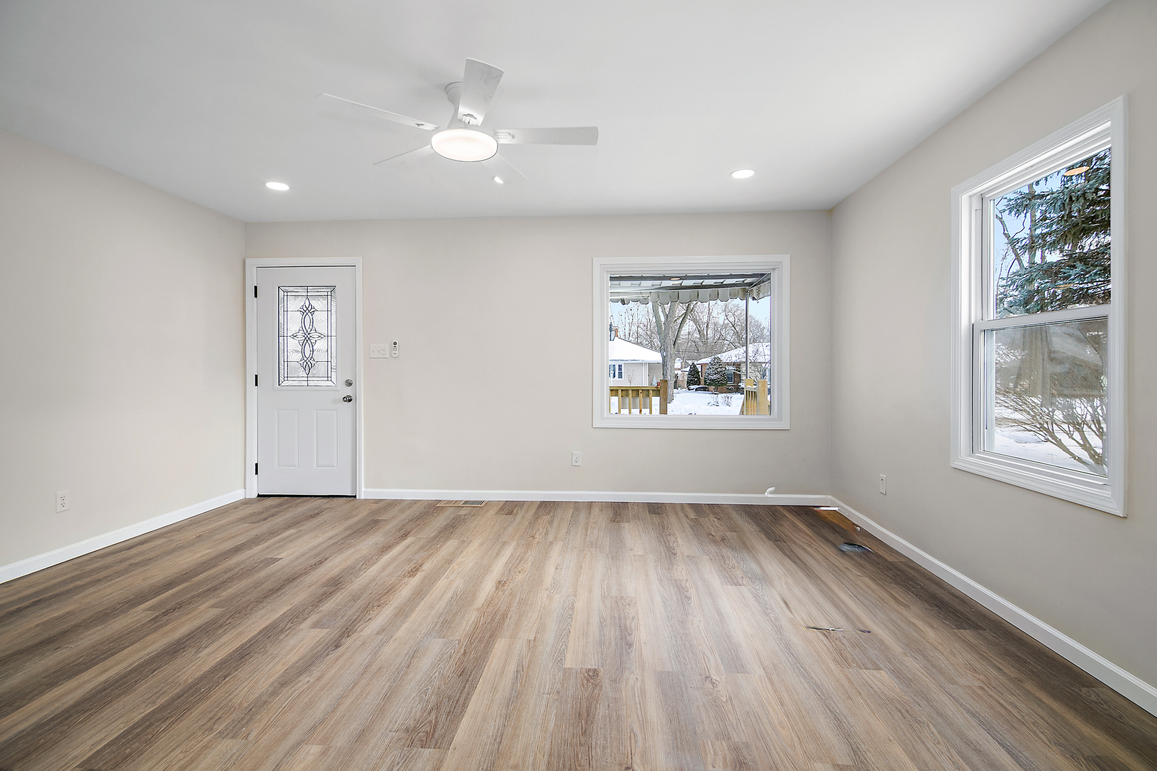 635 South Alma Avenue Kankakee, IL 60901 - Photo 7 of 21 wooden floor in an empty room with a window