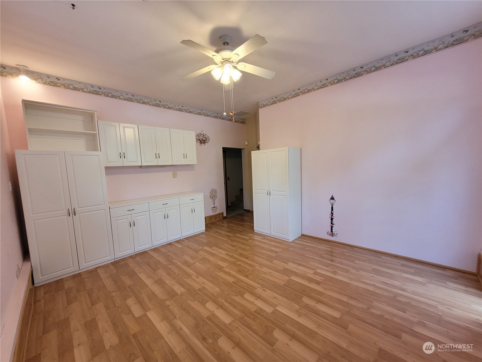 2517 Walnut Loop Northwest Olympia, WA 98502 - Photo 32 of 38 a view of an empty room with a ceiling fan