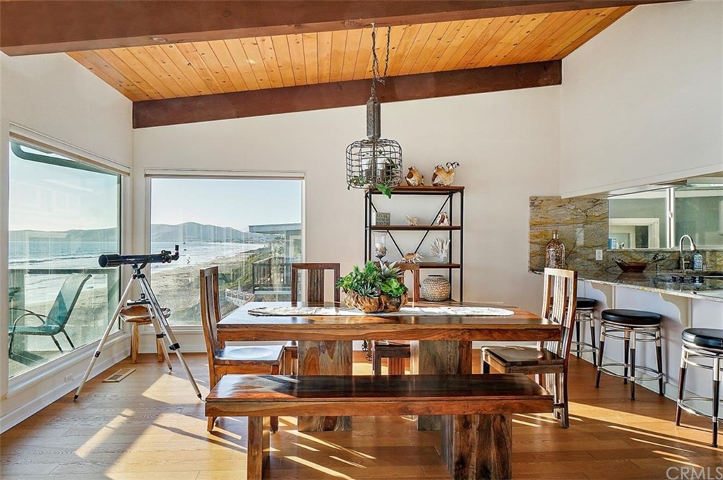 3498 Studio Drive Cayucos, CA 93430 - Photo 12 of 36 a view of a dining room with furniture window and outside view