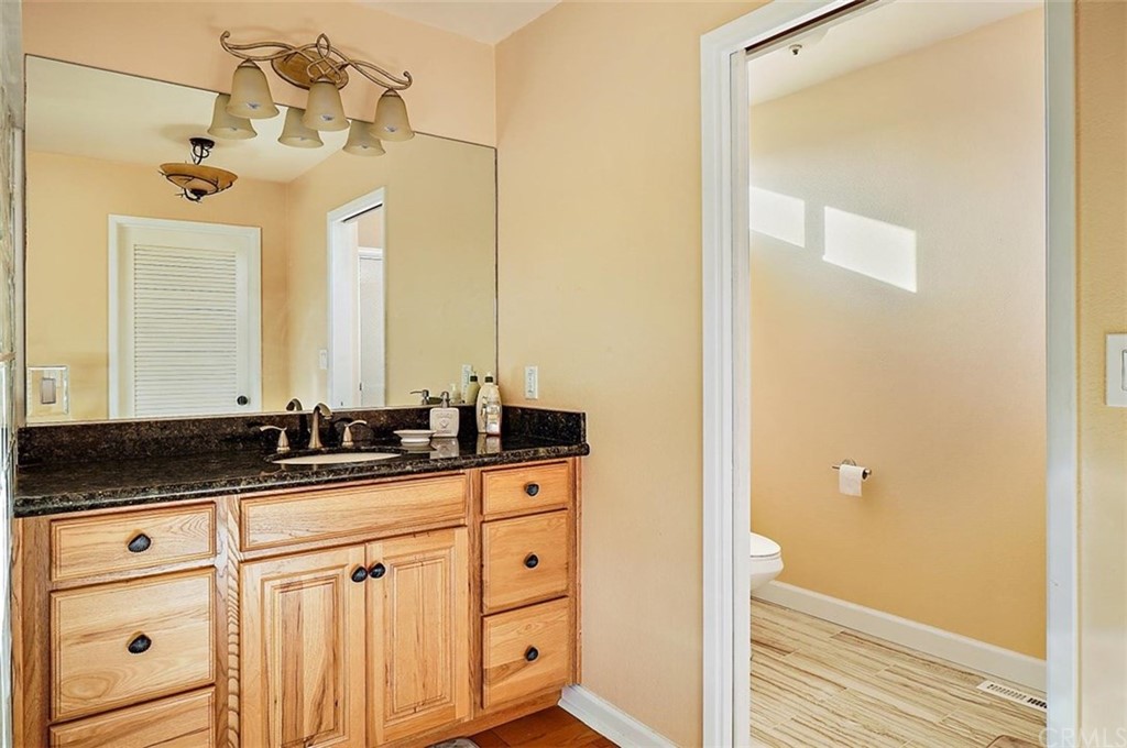 3498 Studio Drive Cayucos, CA 93430 - Photo 22 of 36 a bathroom with a sink and a mirror
