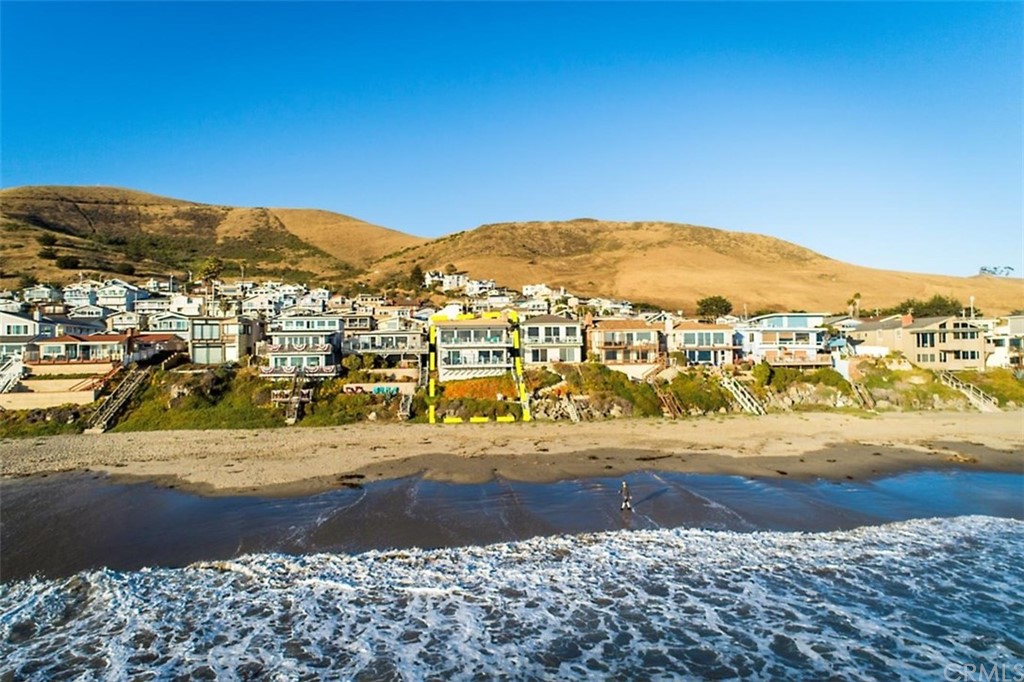 3498 Studio Drive Cayucos, CA 93430 - Photo 5 of 36 a view of an ocean with a mountain