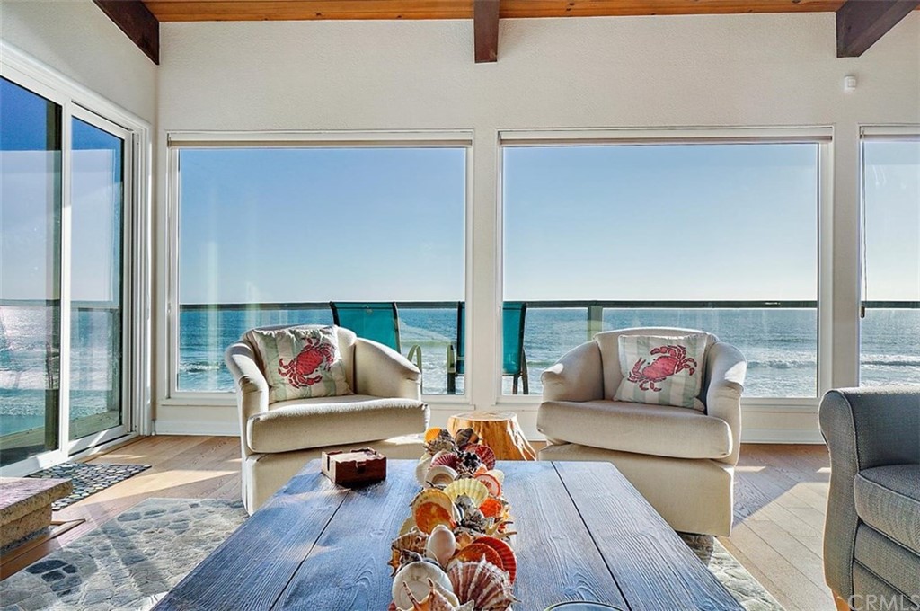 3498 Studio Drive Cayucos, CA 93430 - Photo 10 of 36 a living room with furniture and wooden floor