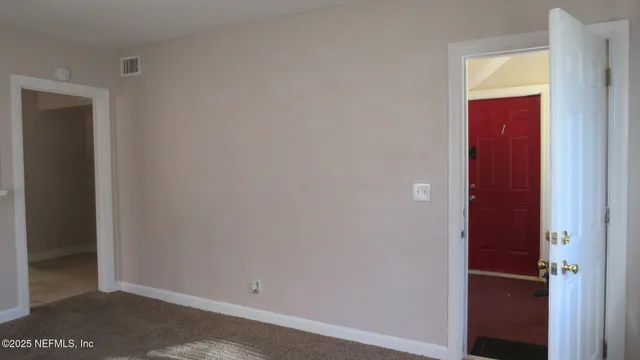 a view of hallway with a small space