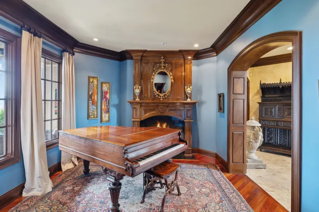 a kitchen with stainless steel appliances granite countertop a stove and a refrigerator