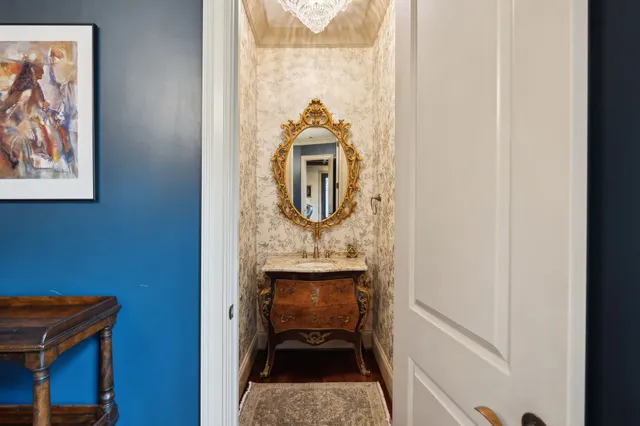 a view of a swimming pool with outdoor seating