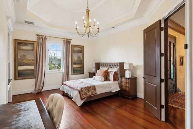 a balcony with table and chairs