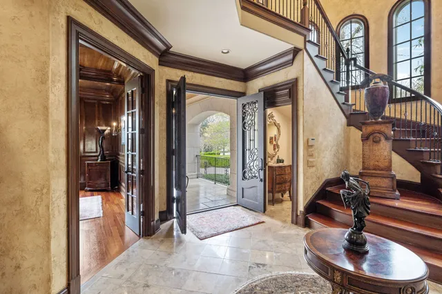 a view of a livingroom with furniture window and wooden floor