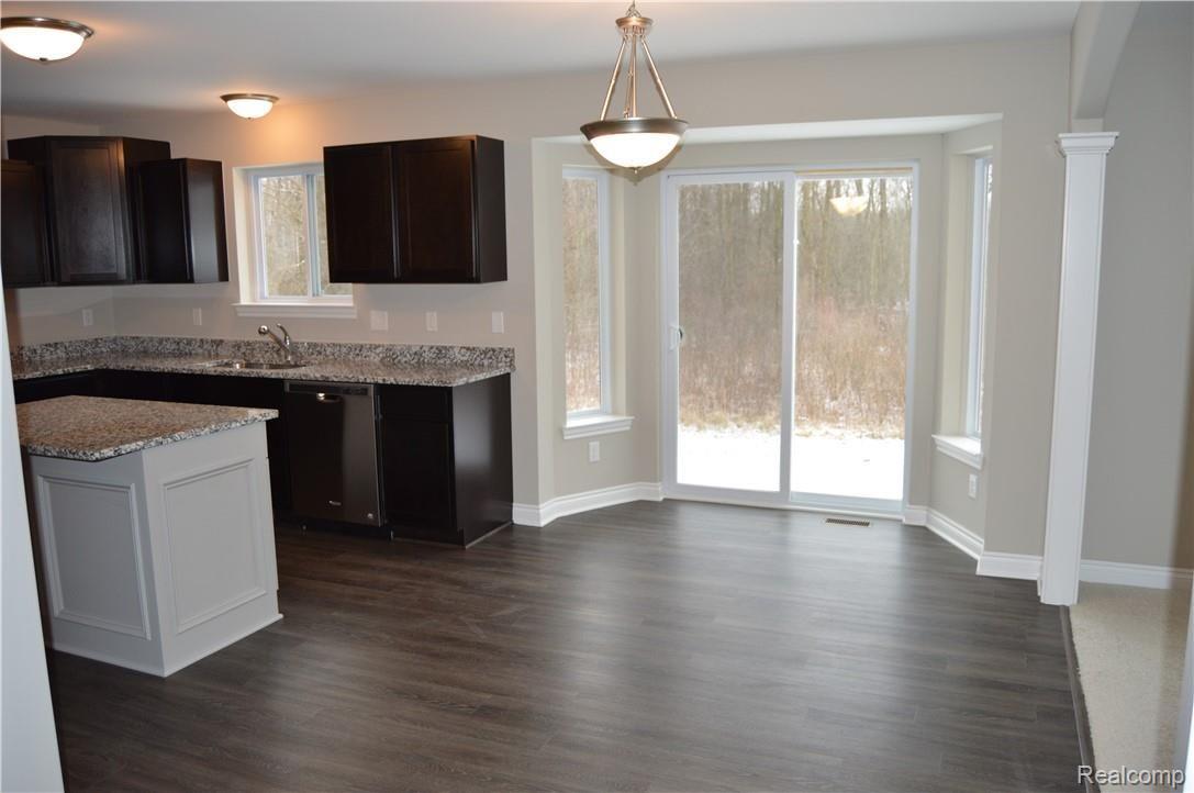 42619 Colonial Road Belleville, MI 48111 - Photo 7 of 19 Sundrenched Kitchen Nook Area