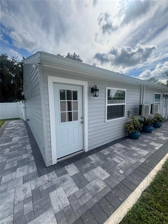 1524 Windermere Road, Unit A Winter Garden, FL 34787 - Photo 1 of 9 a view of a house with a backyard