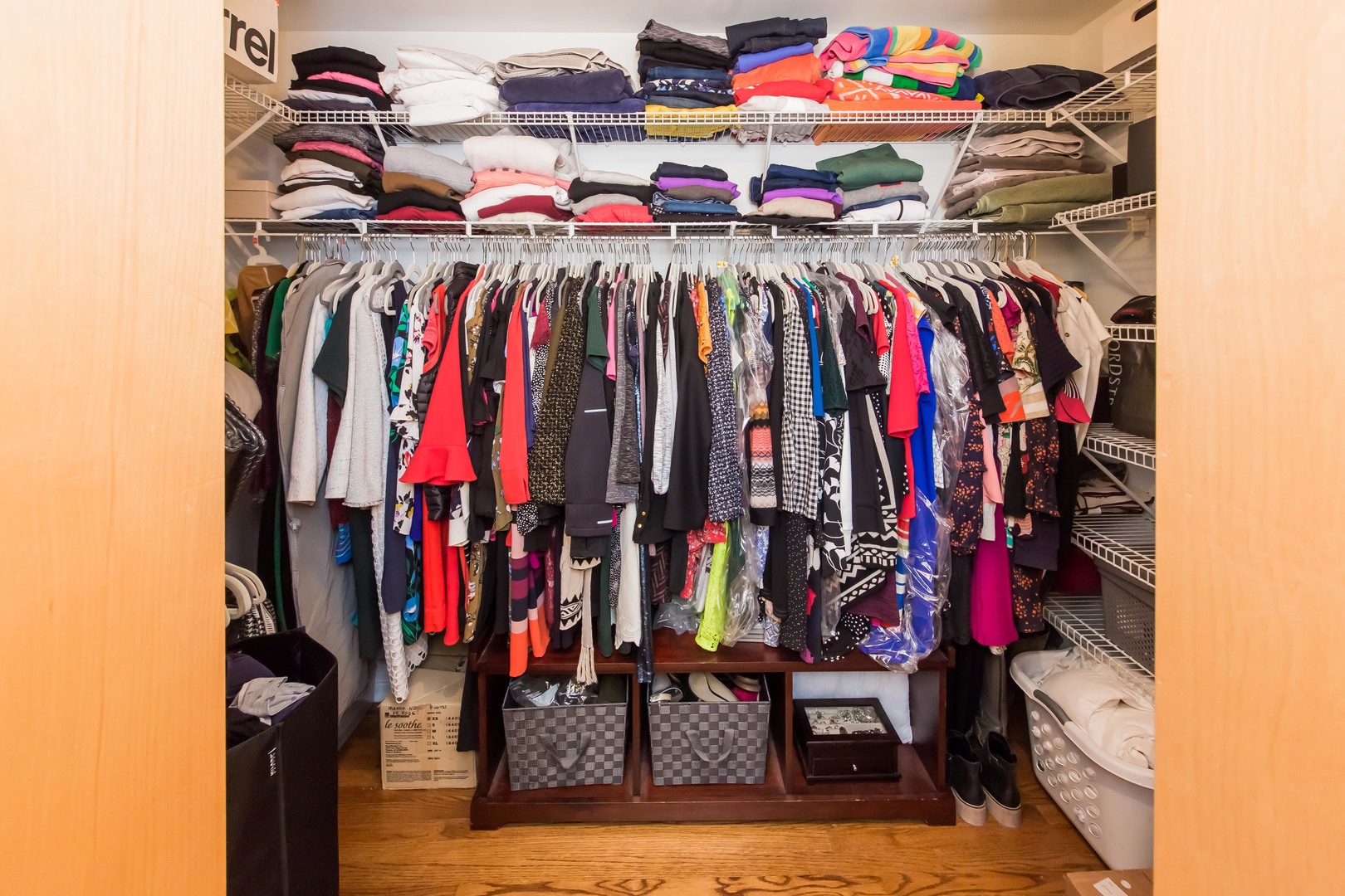 1201 West Adams Street, Unit 705 Chicago, IL 60607 - Photo 17 of 30 a view of walk in closet with clothes