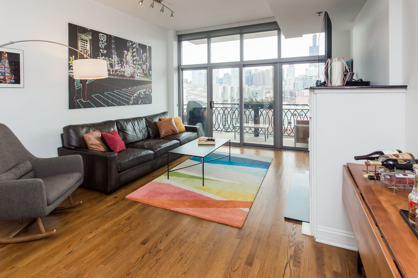 1201 West Adams Street, Unit 705 Chicago, IL 60607 - Photo 4 of 30 a living room with furniture and a large window