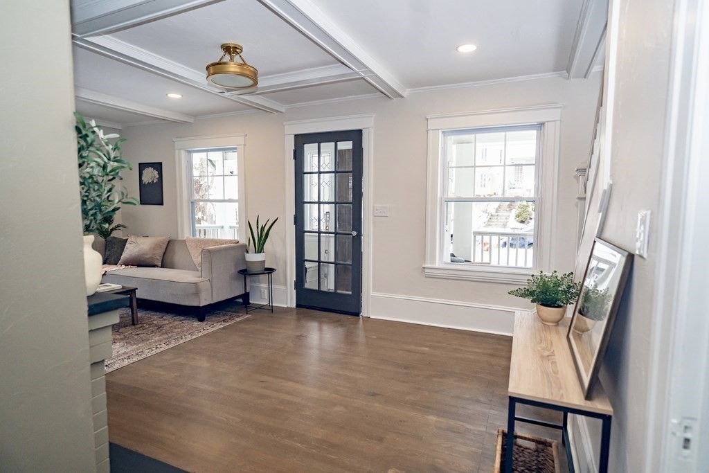 65 Hadwen Road Worcester, MA 01602 - Photo 12 of 38 a living room with furniture and a large window