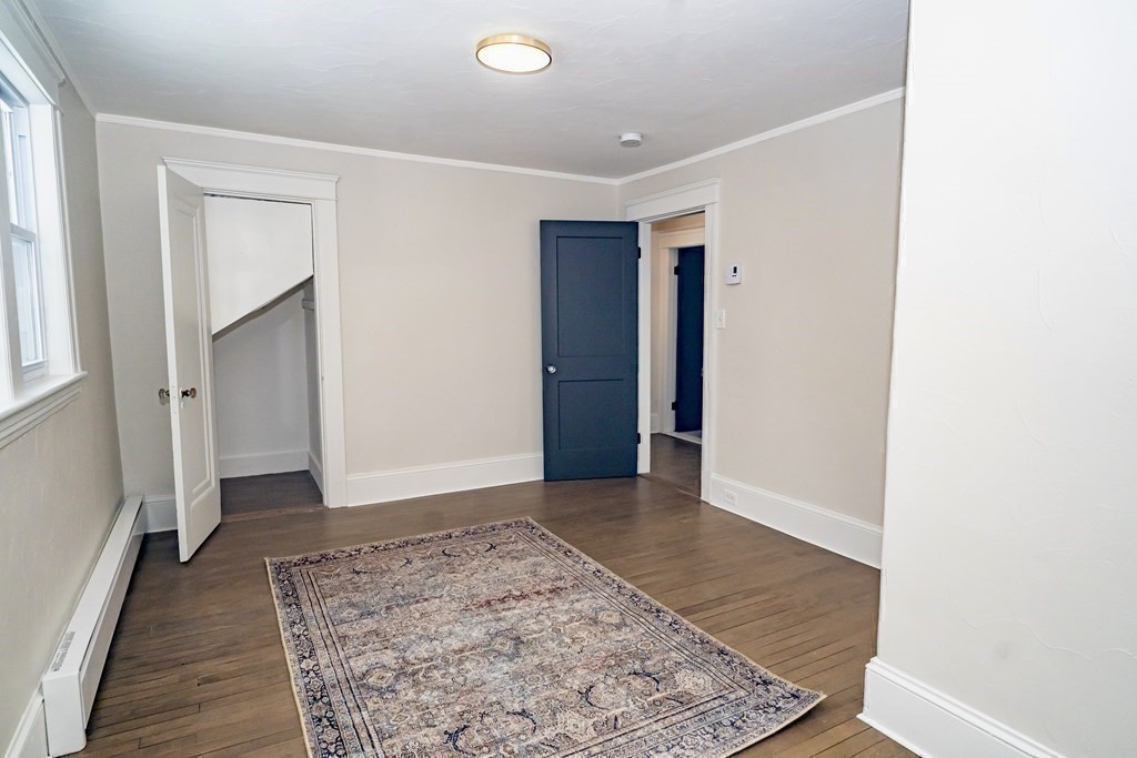 65 Hadwen Road Worcester, MA 01602 - Photo 31 of 38 a view of hallway with a rug and a window