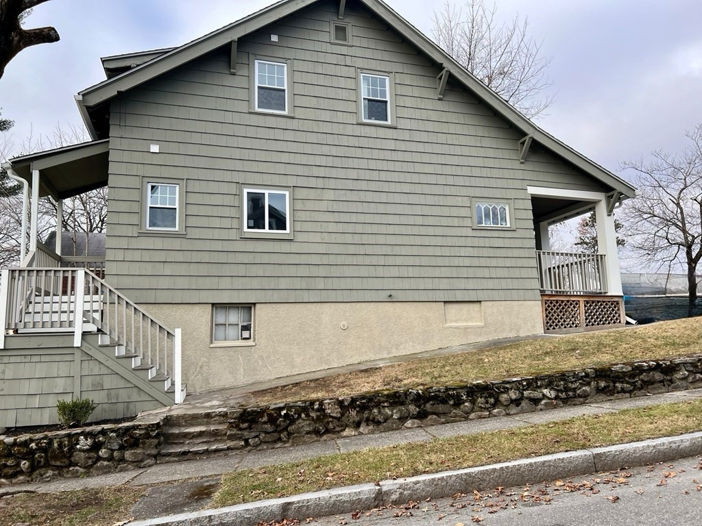 65 Hadwen Road Worcester, MA 01602 - Photo 4 of 38 a front view of a house with a yard