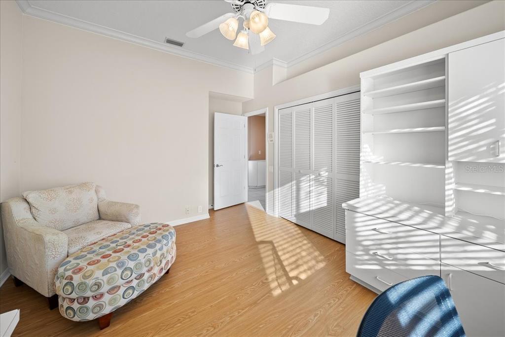 4321 Presidential Ave Circle East Bradenton, FL 34203 - Photo 19 of 49 a living room with furniture and a chandelier