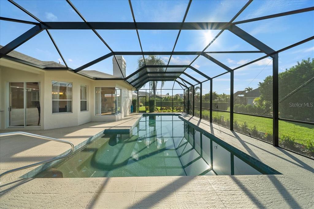 4321 Presidential Ave Circle East Bradenton, FL 34203 - Photo 33 of 49 a swimming pool with a garden view