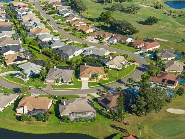 an aerial view of a house with a garden