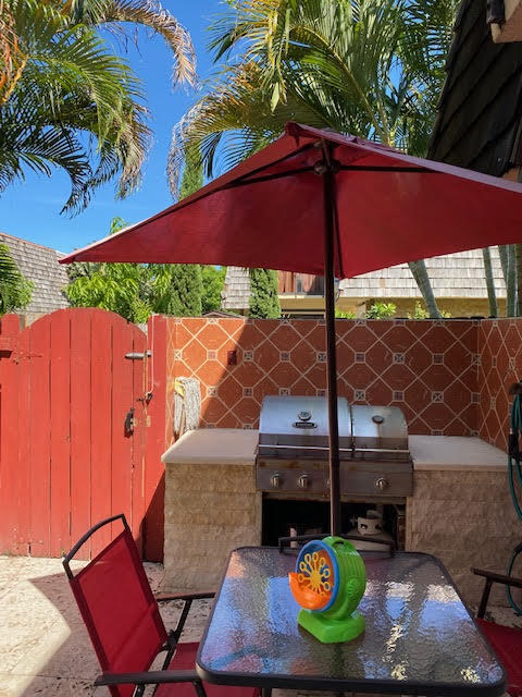 127 Woodland Road Palm Springs, FL 33461 - Photo 5 of 11 swimming pool view with a seating space
