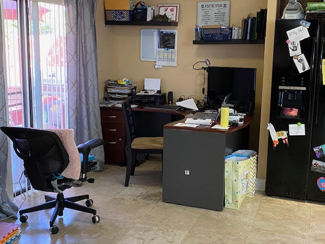 127 Woodland Road Palm Springs, FL 33461 - Photo 8 of 11 a room with furniture and a fireplace