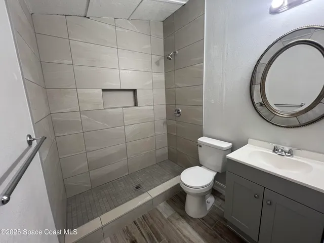 a bathroom with a toilet and a sink