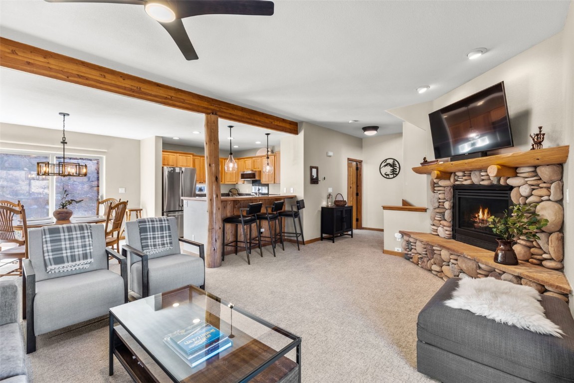 142 Lookout Ridge Drive Dillon, CO 80435 - Photo 2 of 39 Living room with a fireplace, and ceiling fan