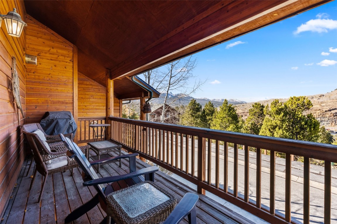 142 Lookout Ridge Drive Dillon, CO 80435 - Photo 6 of 39 Wooden deck featuring a mountain view and area for grilling