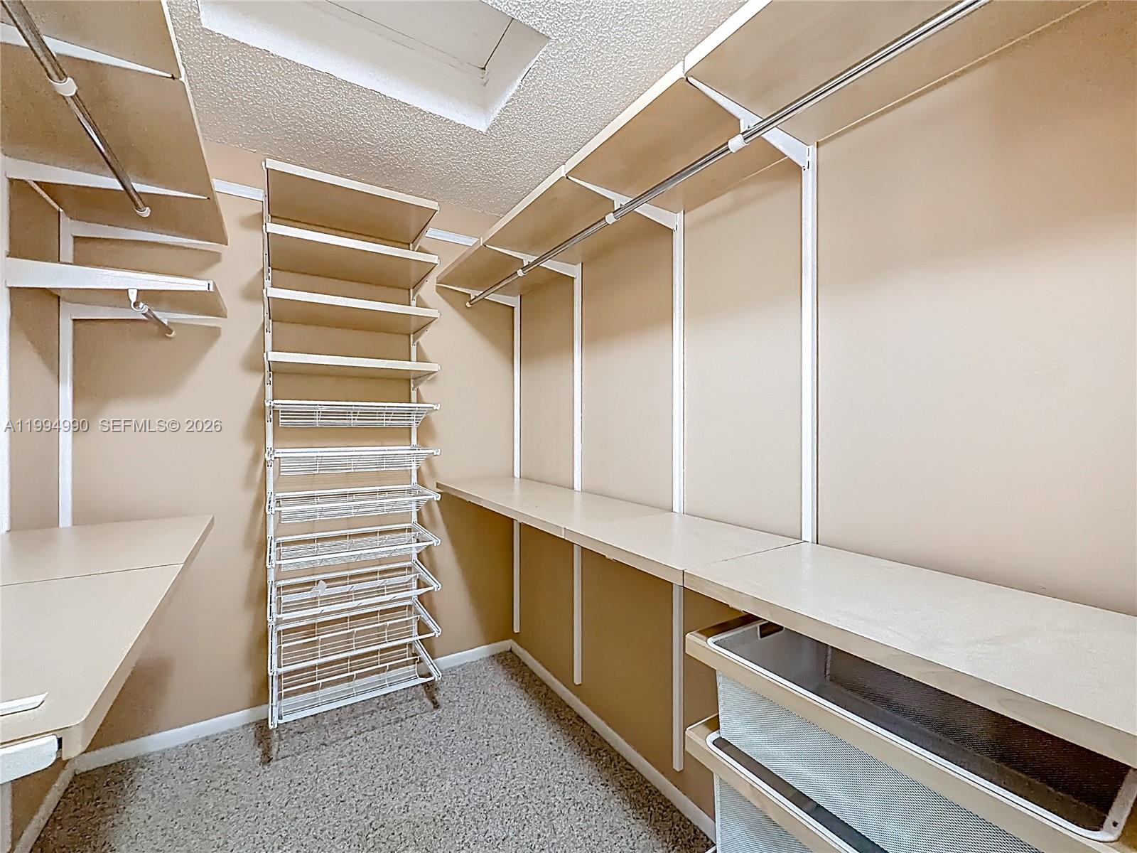 5043 Pointe Emerald Lane Boca Raton, FL 33431 - Photo 44 of 66 master walk-in closet by Container Store