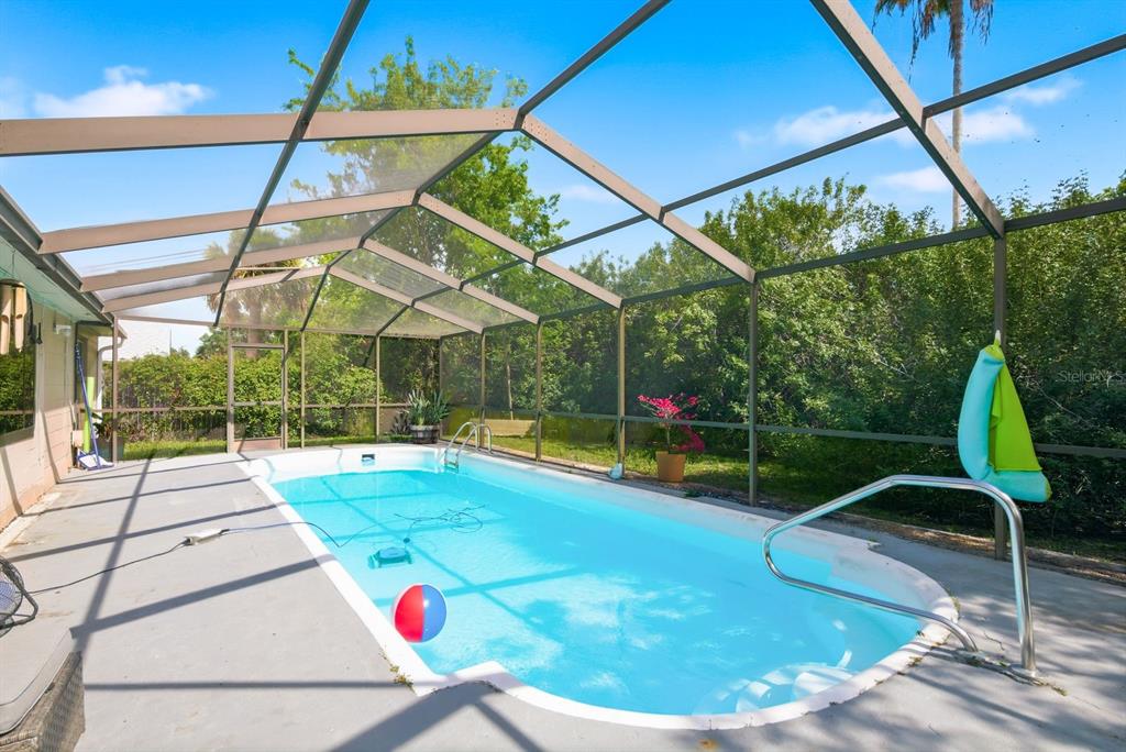 4276 Rudder Way New Port Richey, FL 34652 - Photo 20 of 29 a view of yard with swimming pool