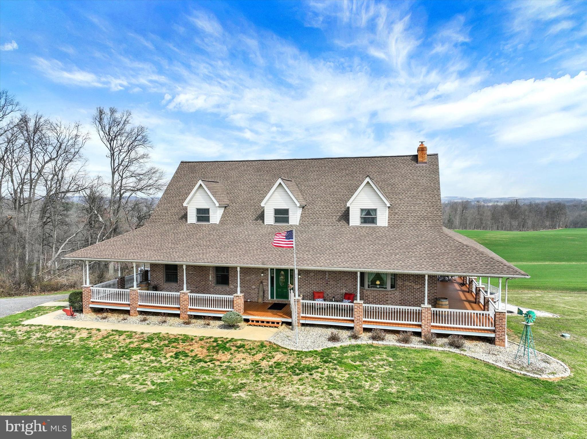 9185 High Rock Road New Park, PA 17352 - Photo 2 of 52 a aerial view of a house next to a big yard