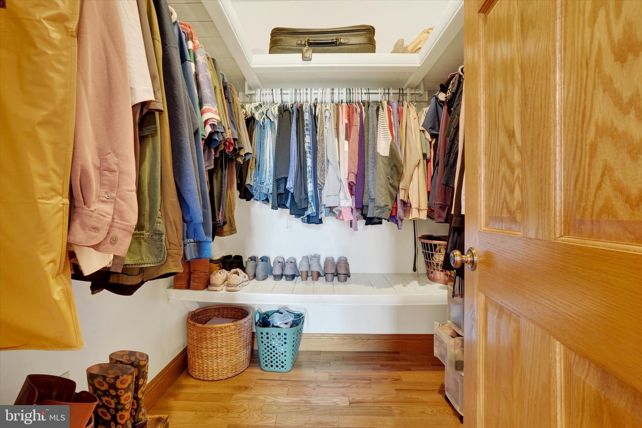 9185 High Rock Road New Park, PA 17352 - Photo 22 of 52 a view of walk in closet with clothes and shoes