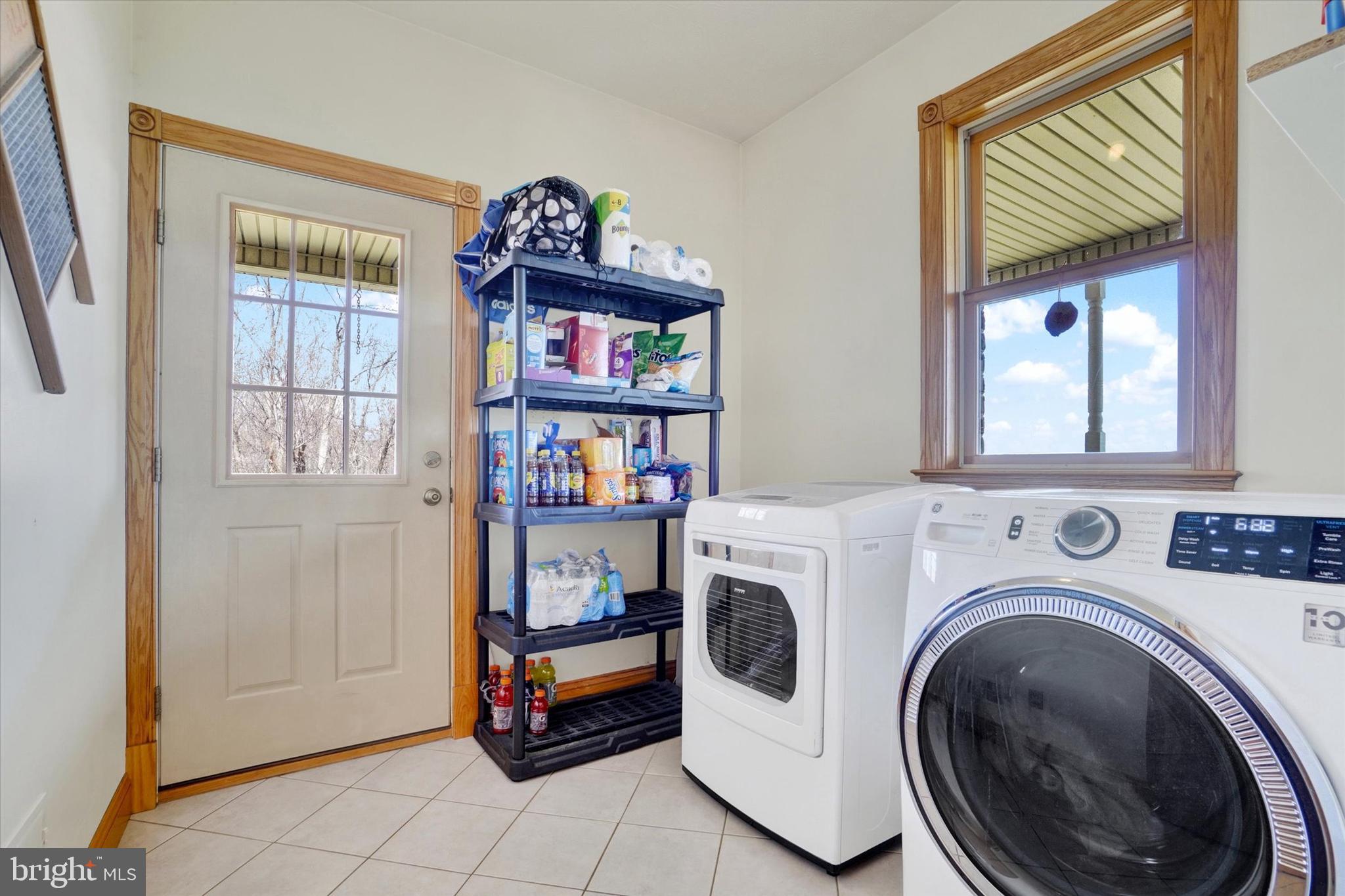 9185 High Rock Road New Park, PA 17352 - Photo 24 of 52 a utility room with dryer and washer