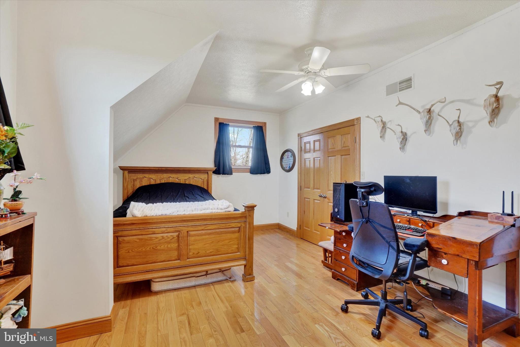 9185 High Rock Road New Park, PA 17352 - Photo 30 of 52 a view of a workspace with furniture and a ceiling fan