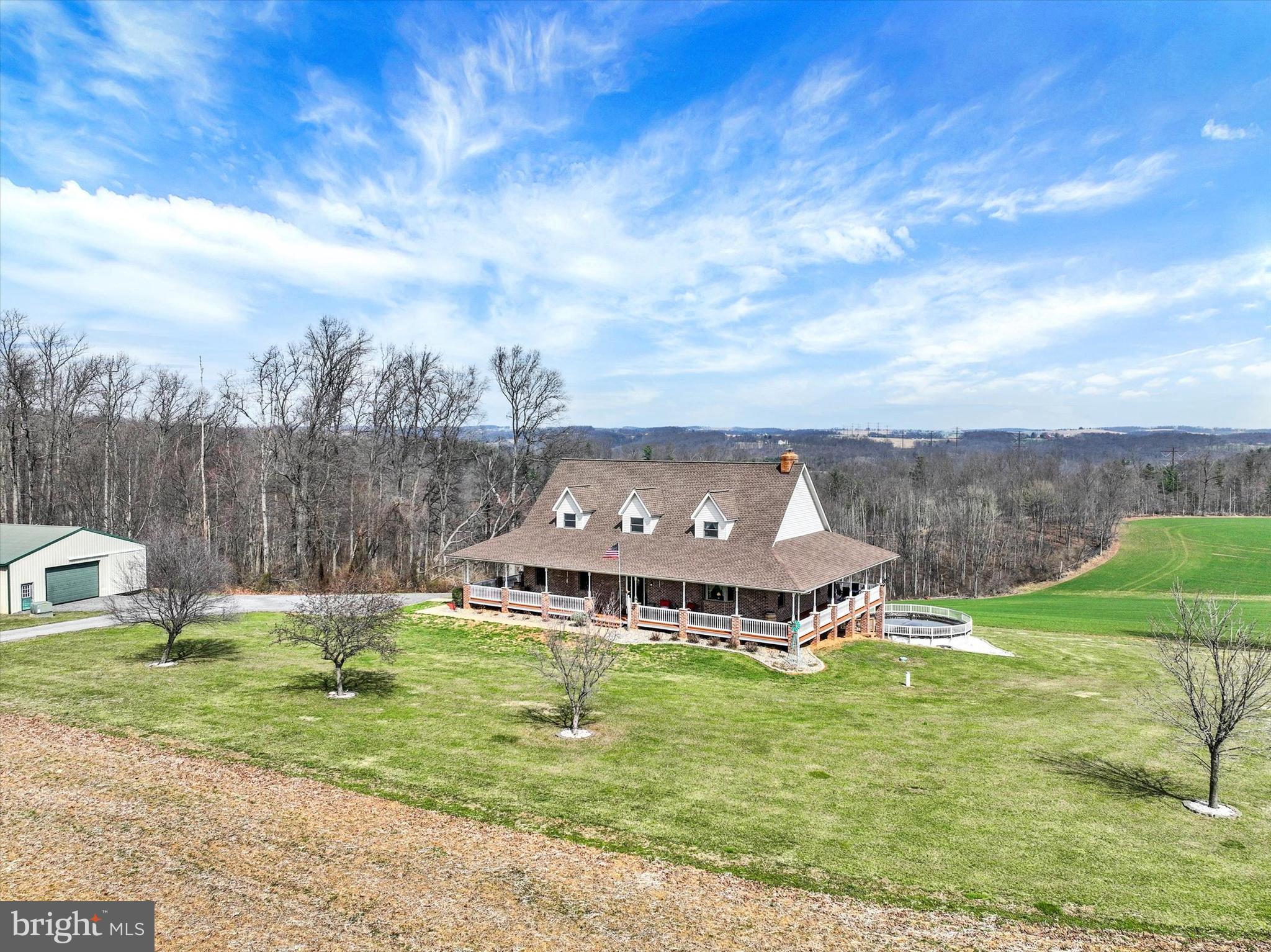 9185 High Rock Road New Park, PA 17352 - Photo 3 of 52 a aerial view of a house with a big yard