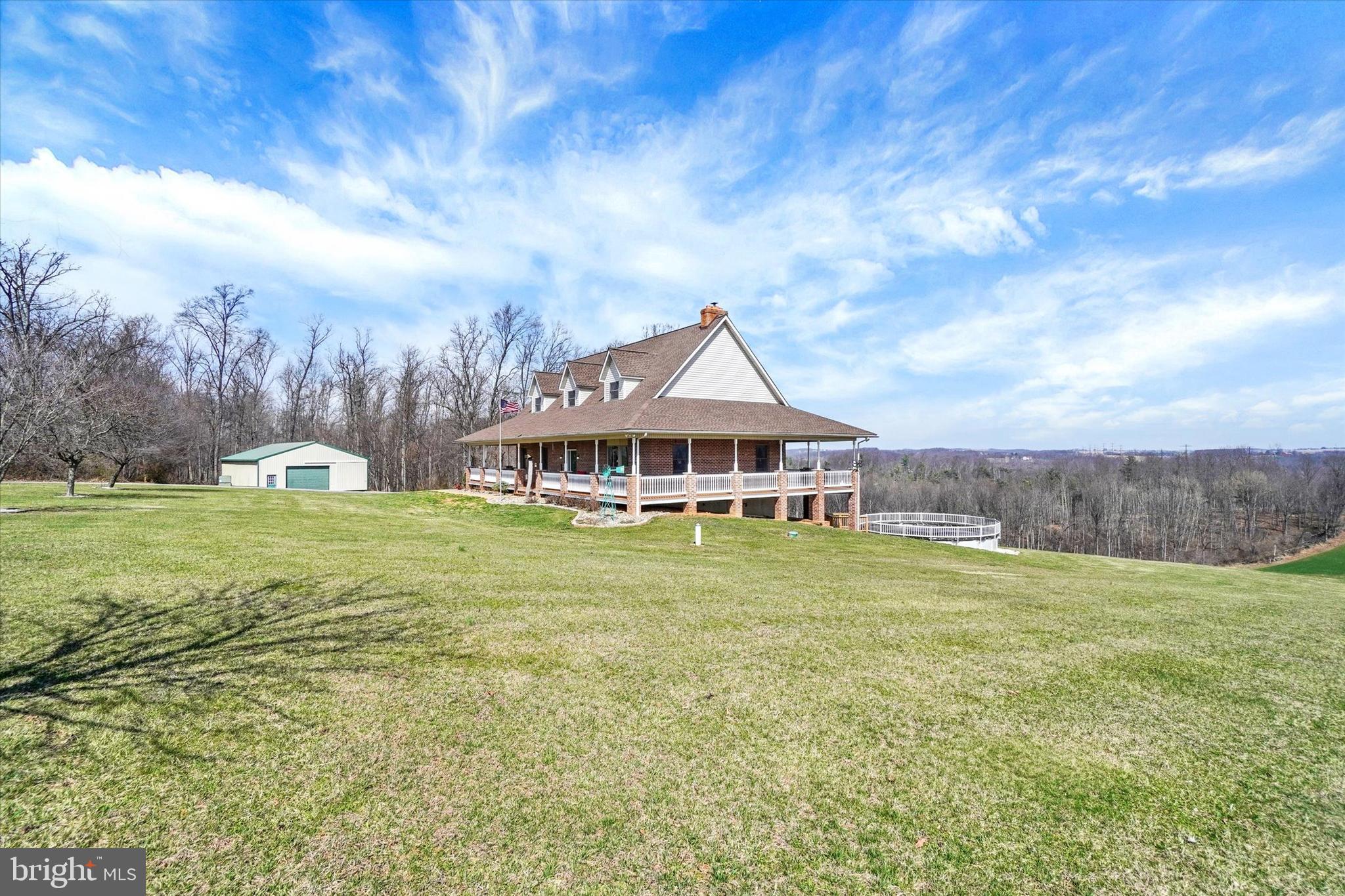 9185 High Rock Road New Park, PA 17352 - Photo 40 of 52 a front view of a house with garden