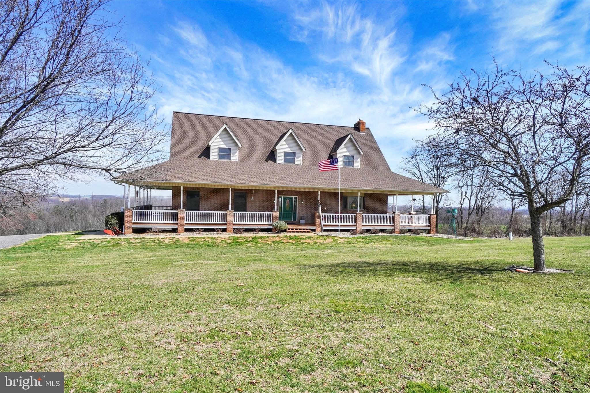9185 High Rock Road New Park, PA 17352 - Photo 40 of 51 a front view of house with yard and trees