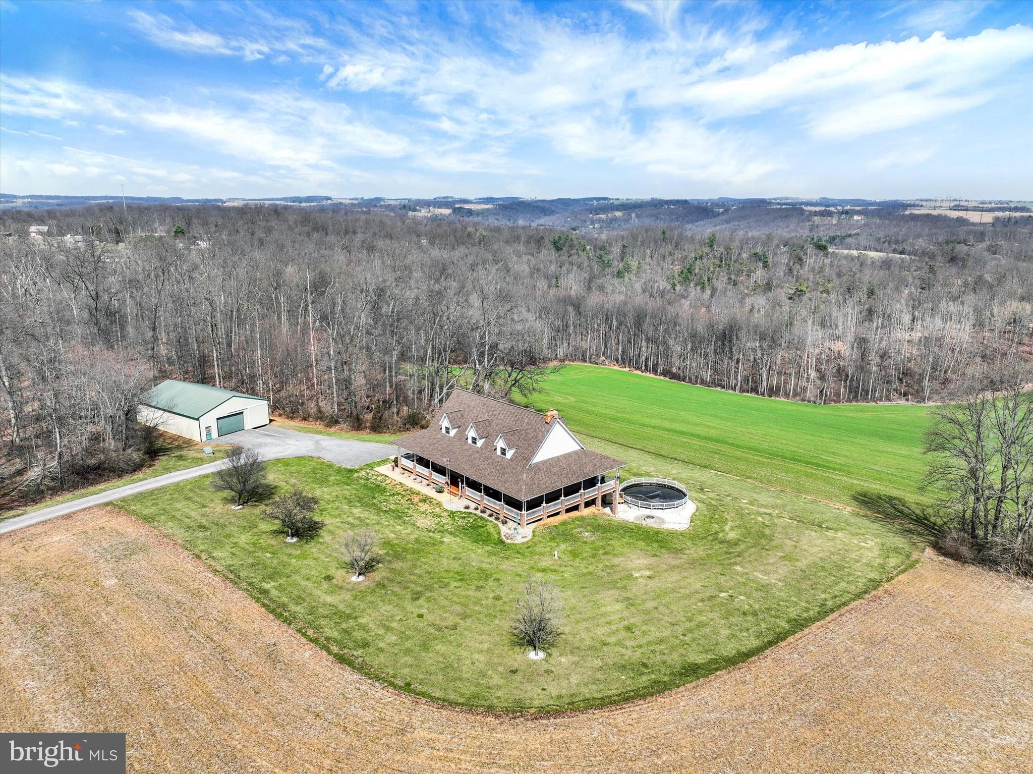 9185 High Rock Road New Park, PA 17352 - Photo 4 of 52 a view of a backyard with sitting area