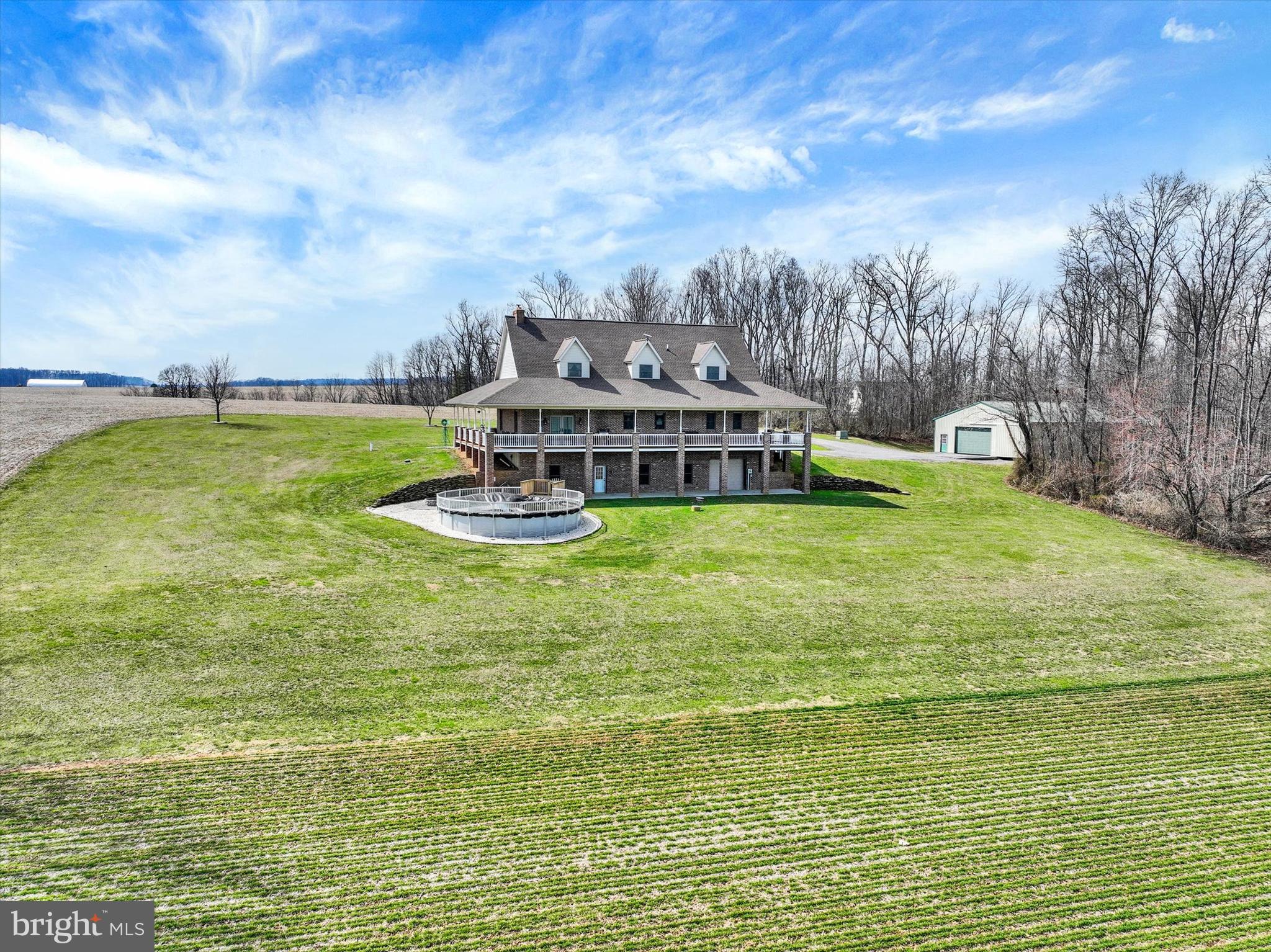 9185 High Rock Road New Park, PA 17352 - Photo 5 of 52 a view of a lake with lawn chairs and iron fence