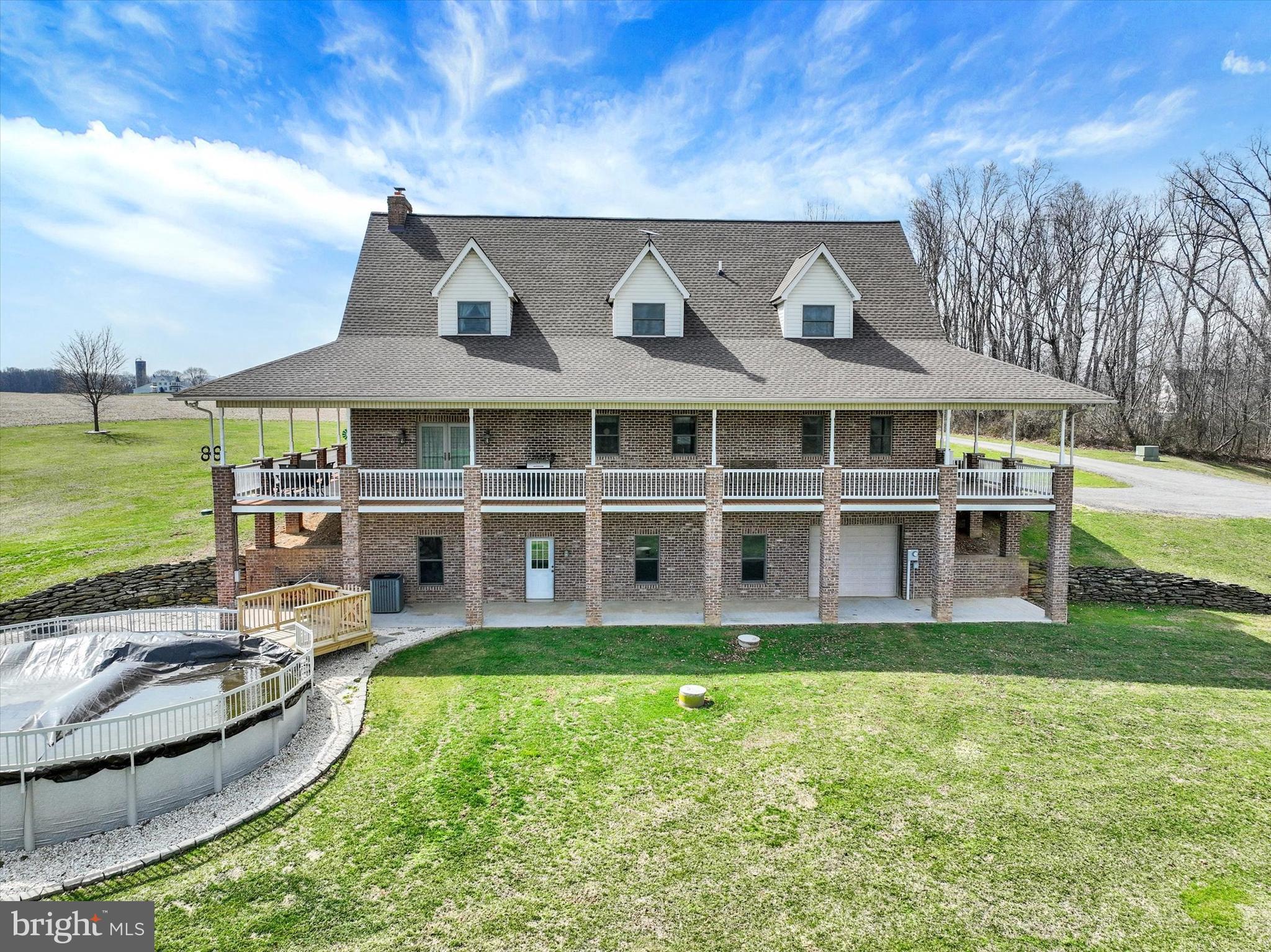 9185 High Rock Road New Park, PA 17352 - Photo 6 of 52 a view of a house with garden