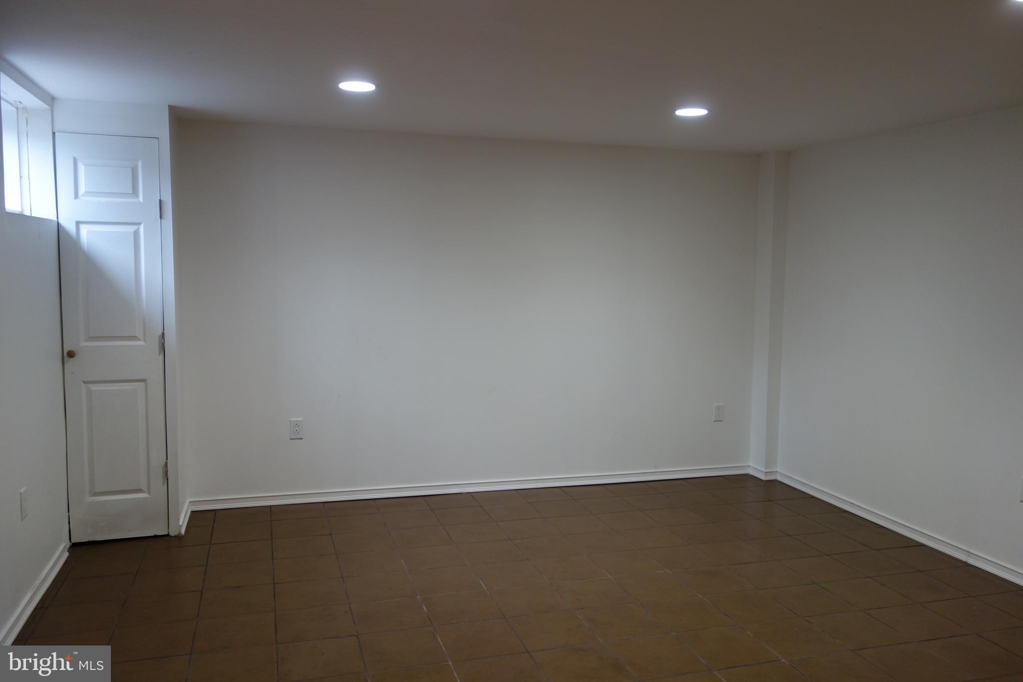 6641 Frederick Road Catonsville, MD 21228 - Photo 15 of 16 Lower level Family Room with 1/2 Bath