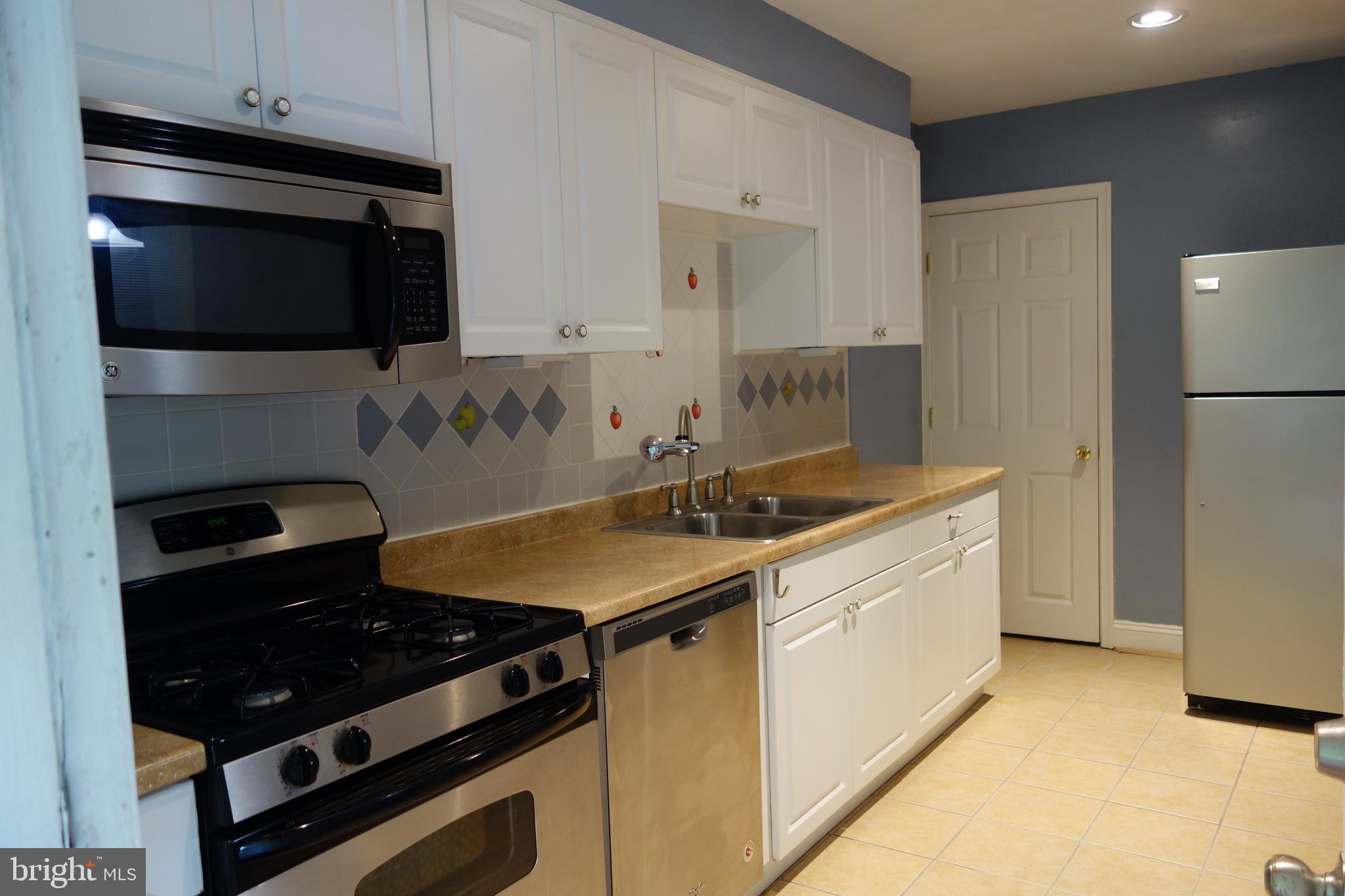 6641 Frederick Road Catonsville, MD 21228 - Photo 5 of 16 Kitchen with Stainless Appliances