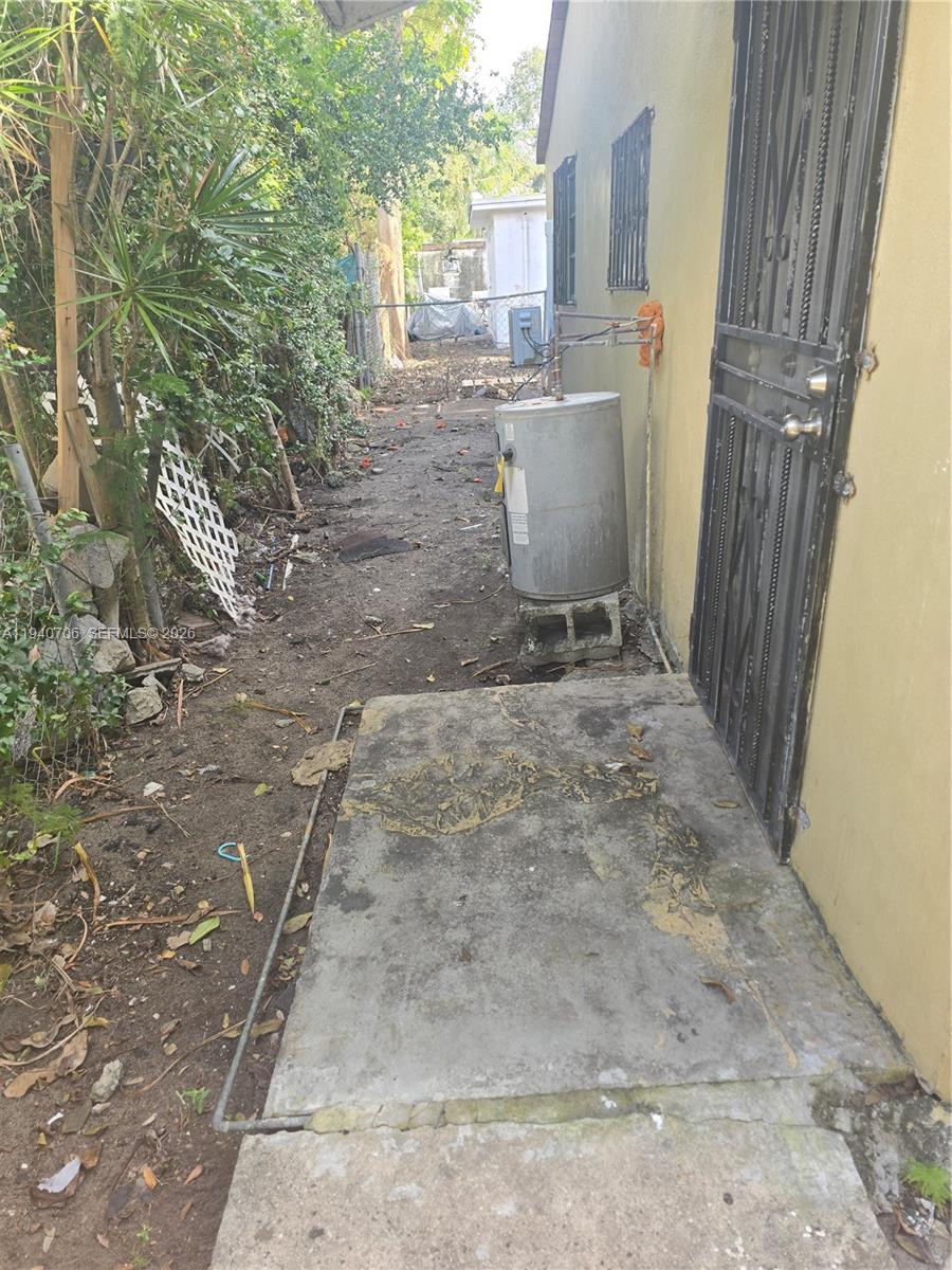 143 Northwest 69th Street, Unit 3 Miami, FL 33150 - Photo 7 of 7 a view of a storage room with a sink