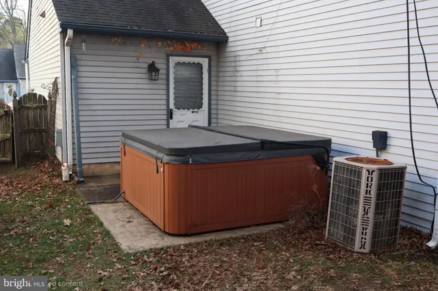 a living room with furniture a window and a fireplace