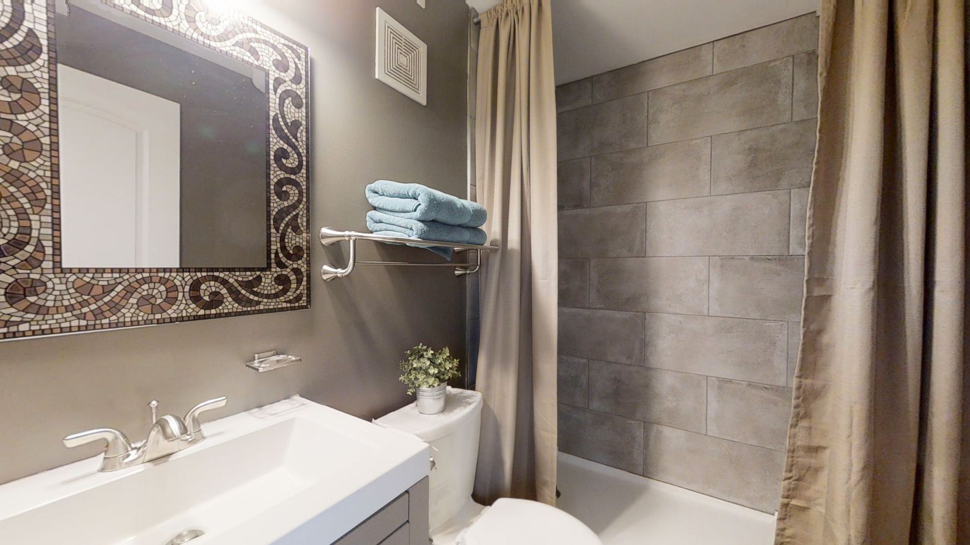 153 Queenswood Road Bolingbrook, IL 60440 - Photo 13 of 17 a bathroom with a sink toilet and shower