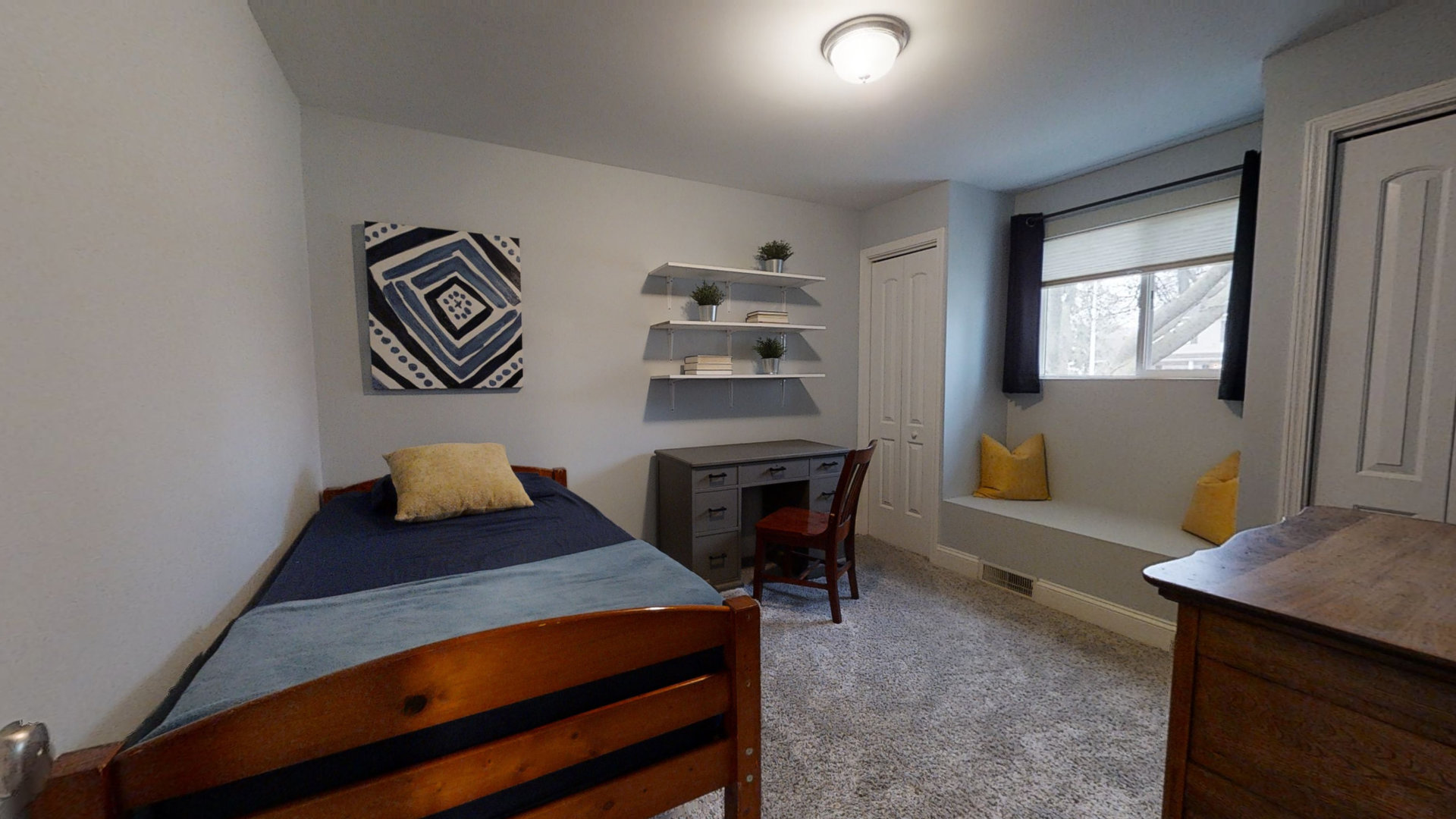 153 Queenswood Road Bolingbrook, IL 60440 - Photo 16 of 17 a bedroom with a bed and a table in it