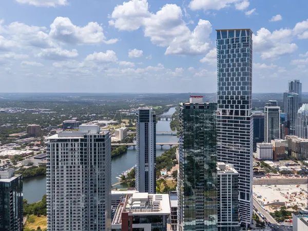 a view of a city with tall buildings