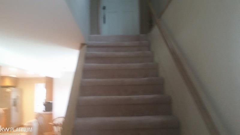 12933 Burt Road Memphis, MI 48041 - Photo 19 of 22 stairs to 2 upstairs bedrooms and attic storage