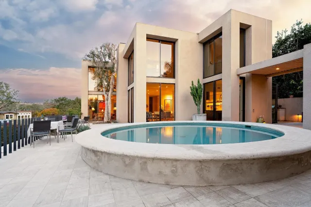 a view of roof with a couches and sky view