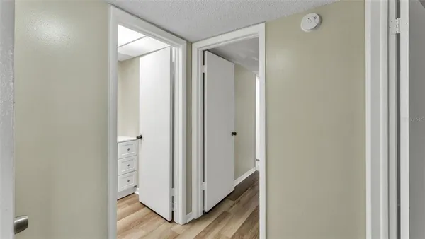 a view of a bathroom with wooden floor